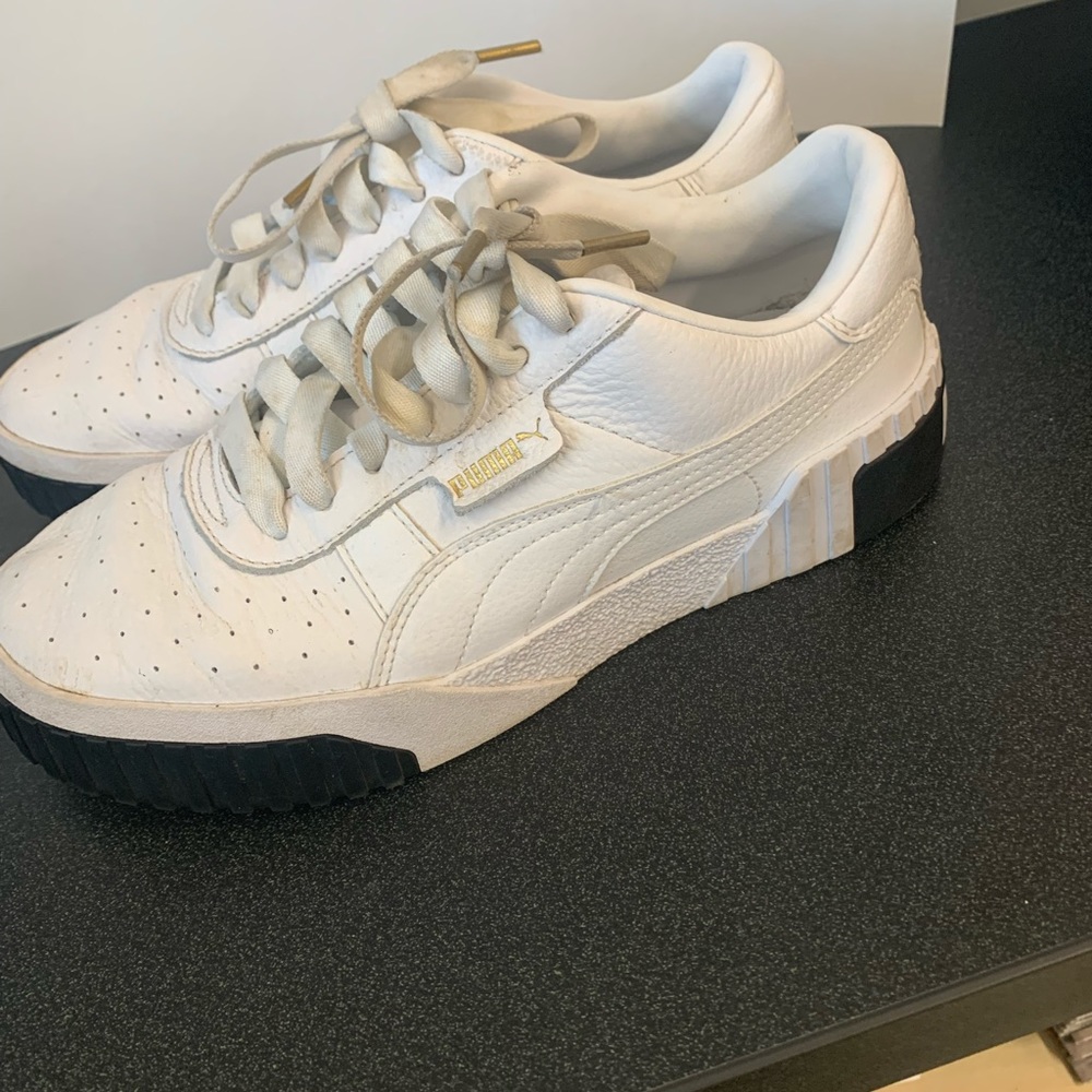 Puma women’s white sneakers